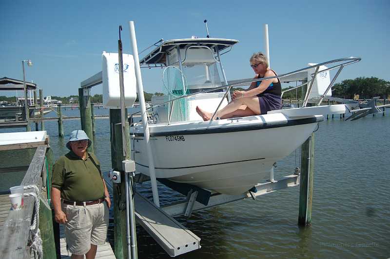 Bridge  - Spring 2006 015.JPG - Ken took Kat, Debbie, and Bill for a boat ride Friday afternoon after bridge playing stopped for the day. Debbie was delighted at the opportunity to ride in the boat; her face dropped when Ken told her the ride consisted of lowering & raising the boat in its lift  :-)